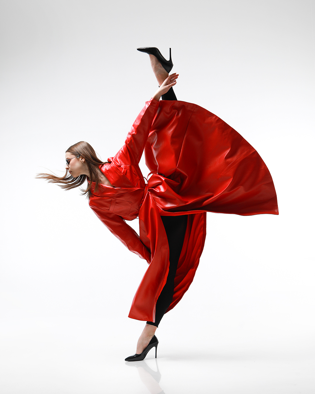 a woman in a red coat