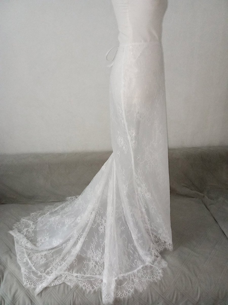 біла мереживна спідниця