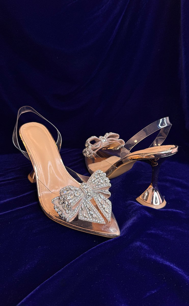 Туфлі із золотим бантиком