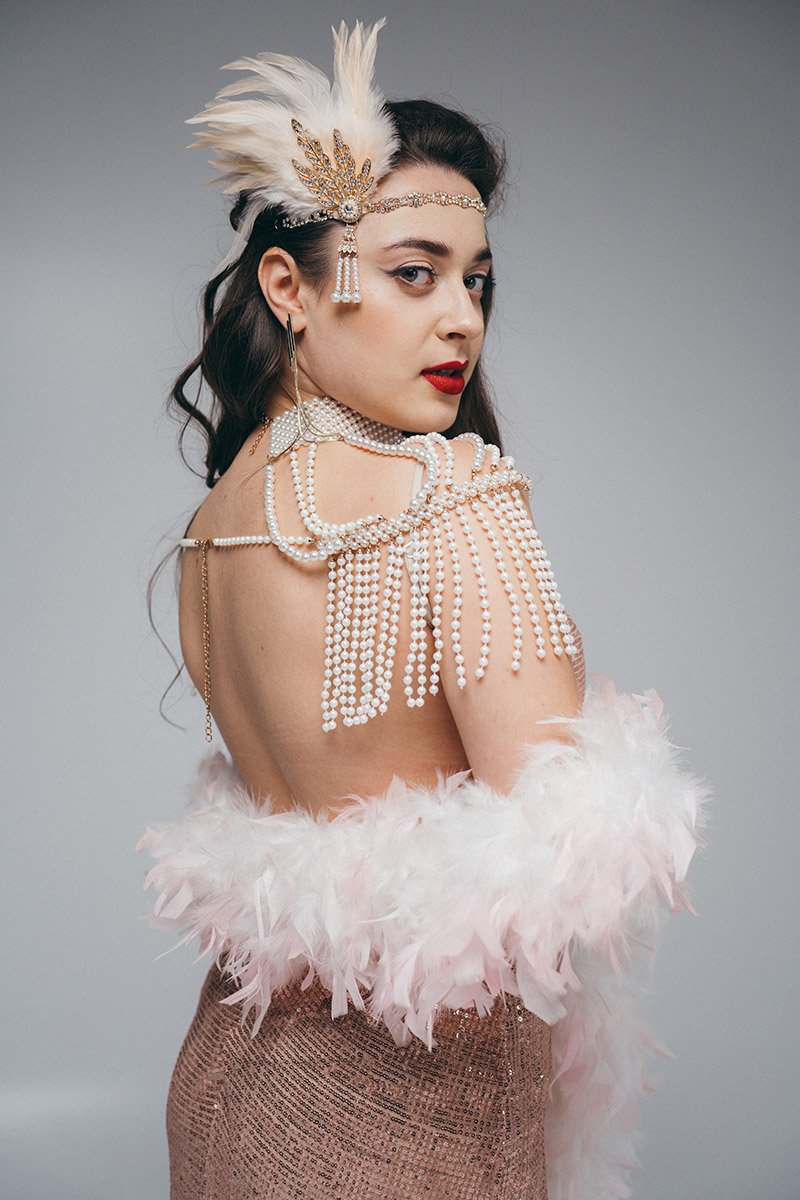 Повʼязка на голову з пірʼям