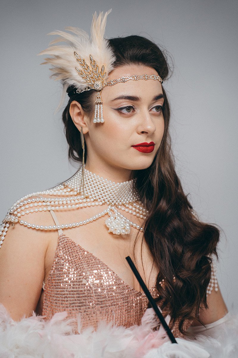 Повʼязка на голову з пірʼям