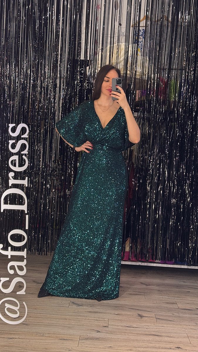 зелена сукня великого розміру