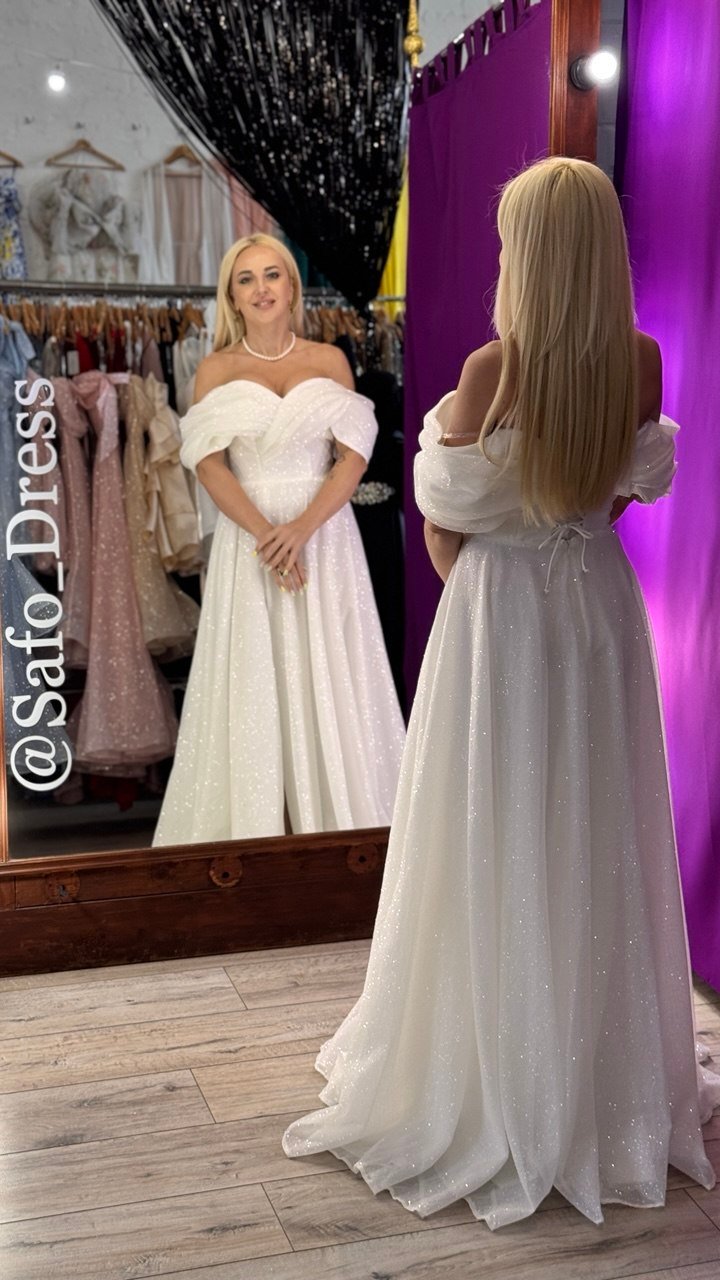 Блискуча весільна сукня купити